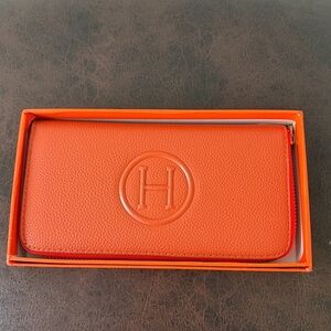 Monogram Orange H Long Zippy Wallet